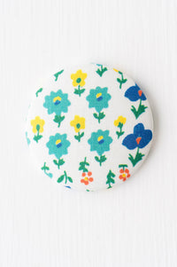 Magnet Mindy floral magnet with blue, yellow, and orange flowers