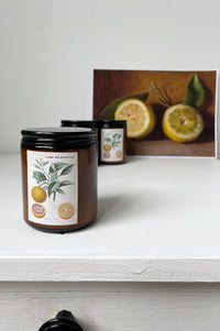 Orange grapefruit candle with vintage botanical label