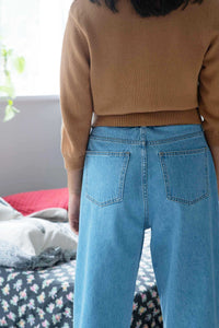 Ava Almond Lucy Jeans, light blue denim jeans and brown sweater