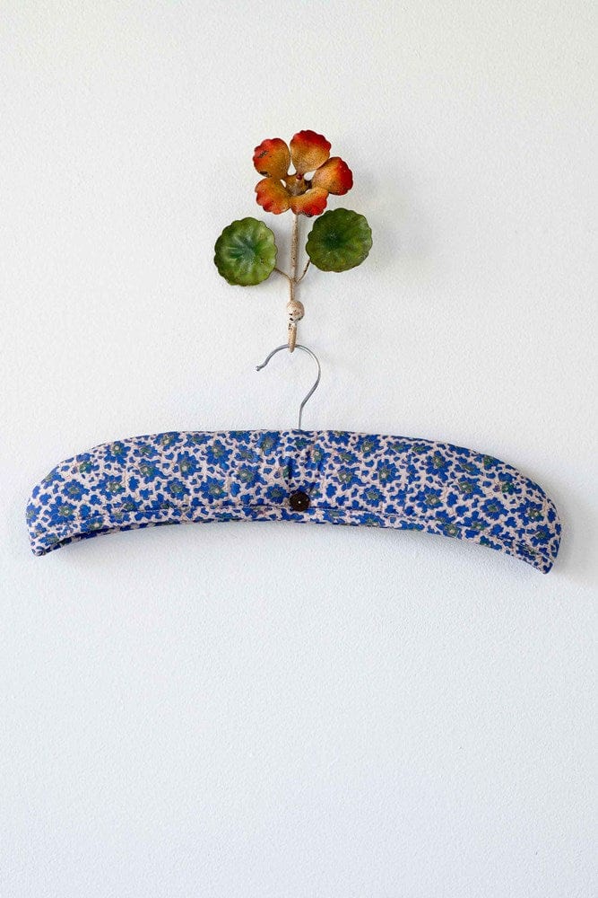 Bluebell floral padded hanger hanging on white wall
