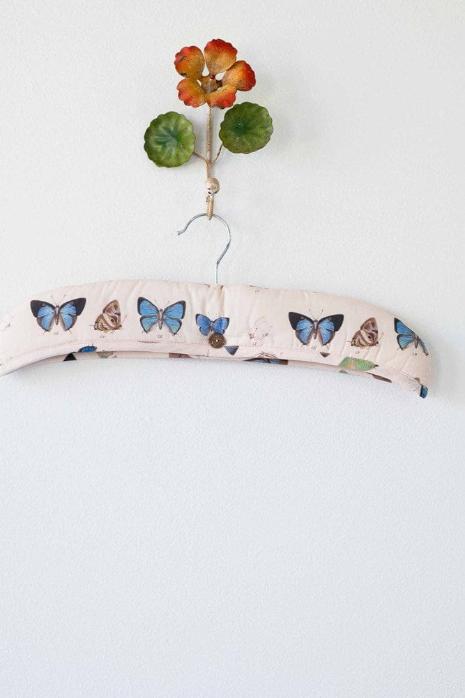 Butterfly-decorated clothes hanger
