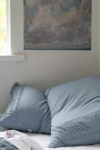Chambray pillowcase set on bed