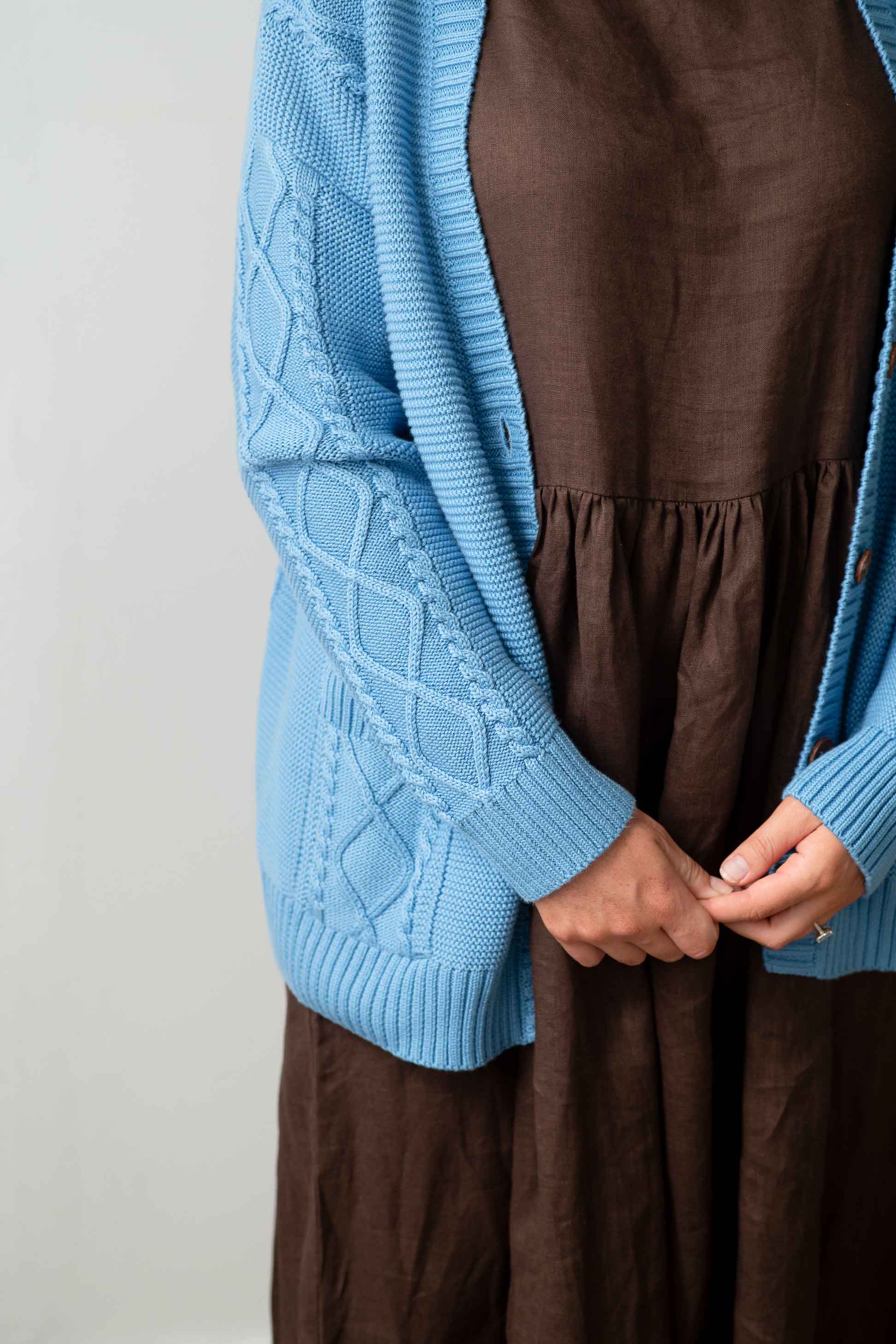 CharliLichenElizaChicory - Blue cable knit cardigan & brown dress