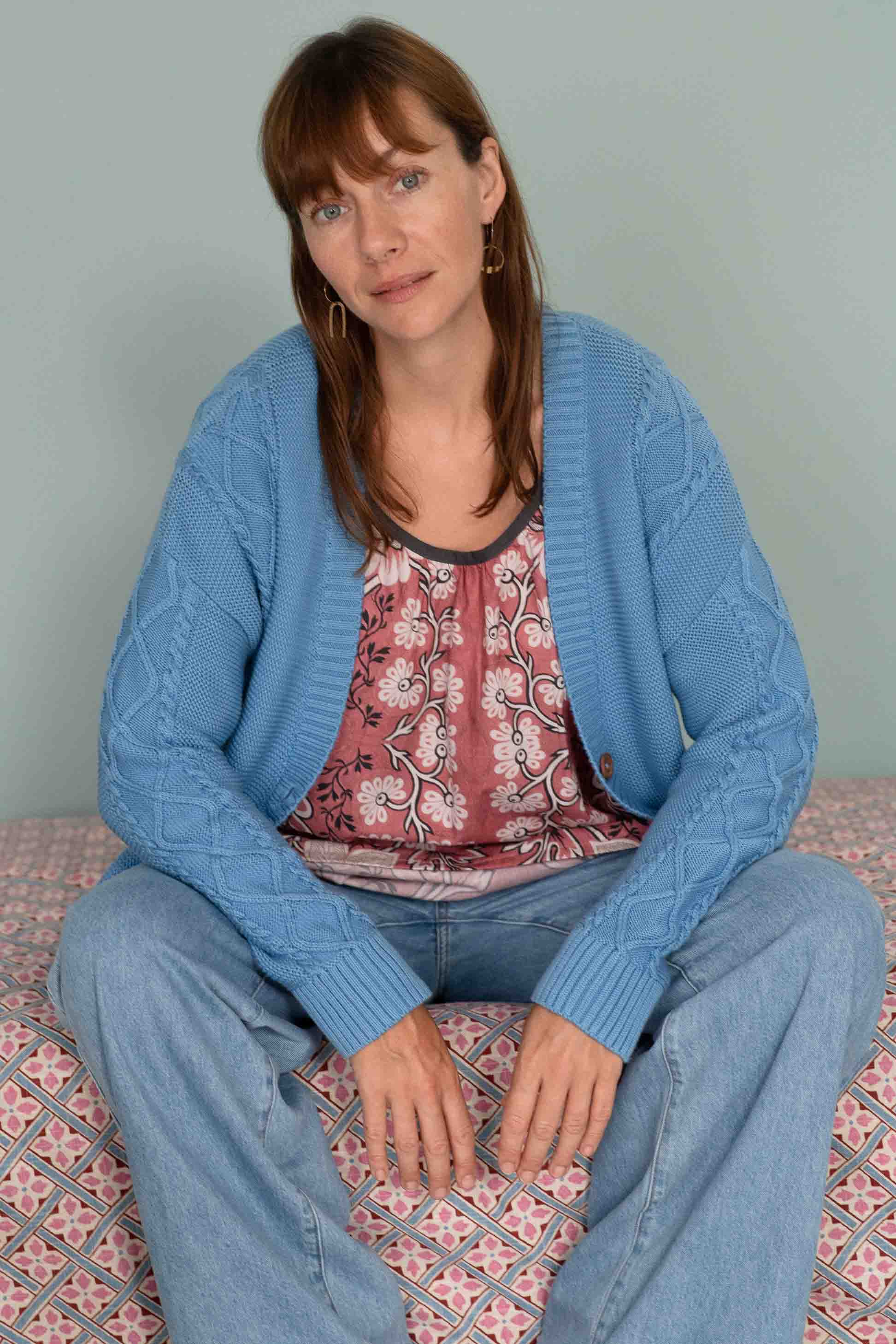 Charli in French floral top and jeans