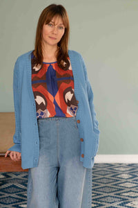 CharliLichenHetti Top & Denim - Woman in Blue Cardigan