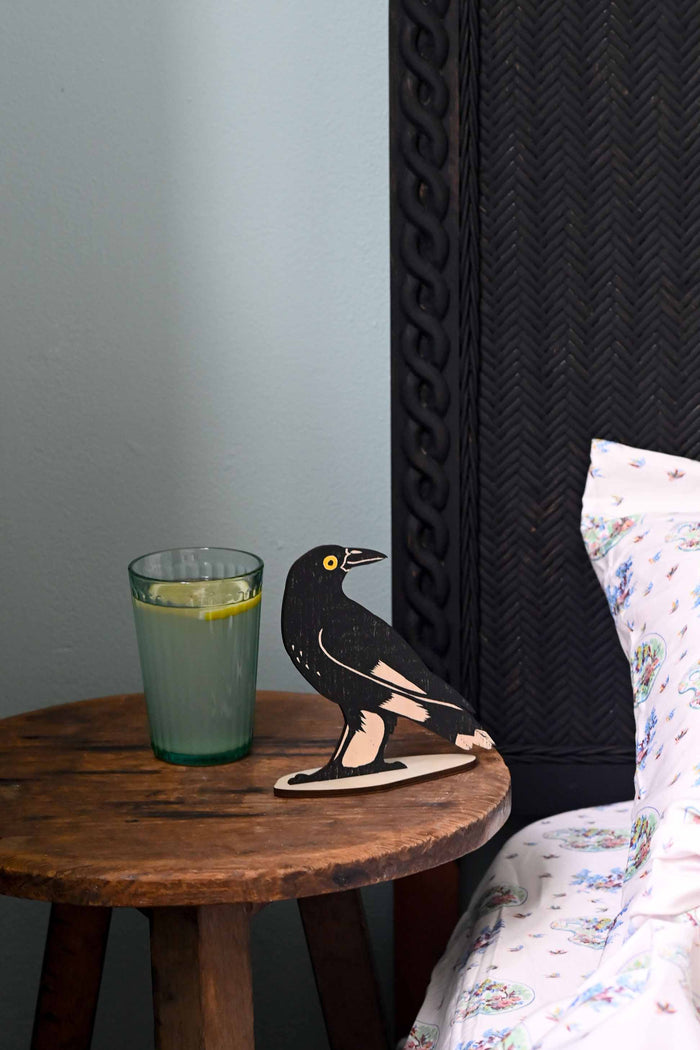 Currawong stand with glass of water and bed detail