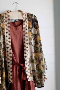 Floral kimono and rust-colored dress