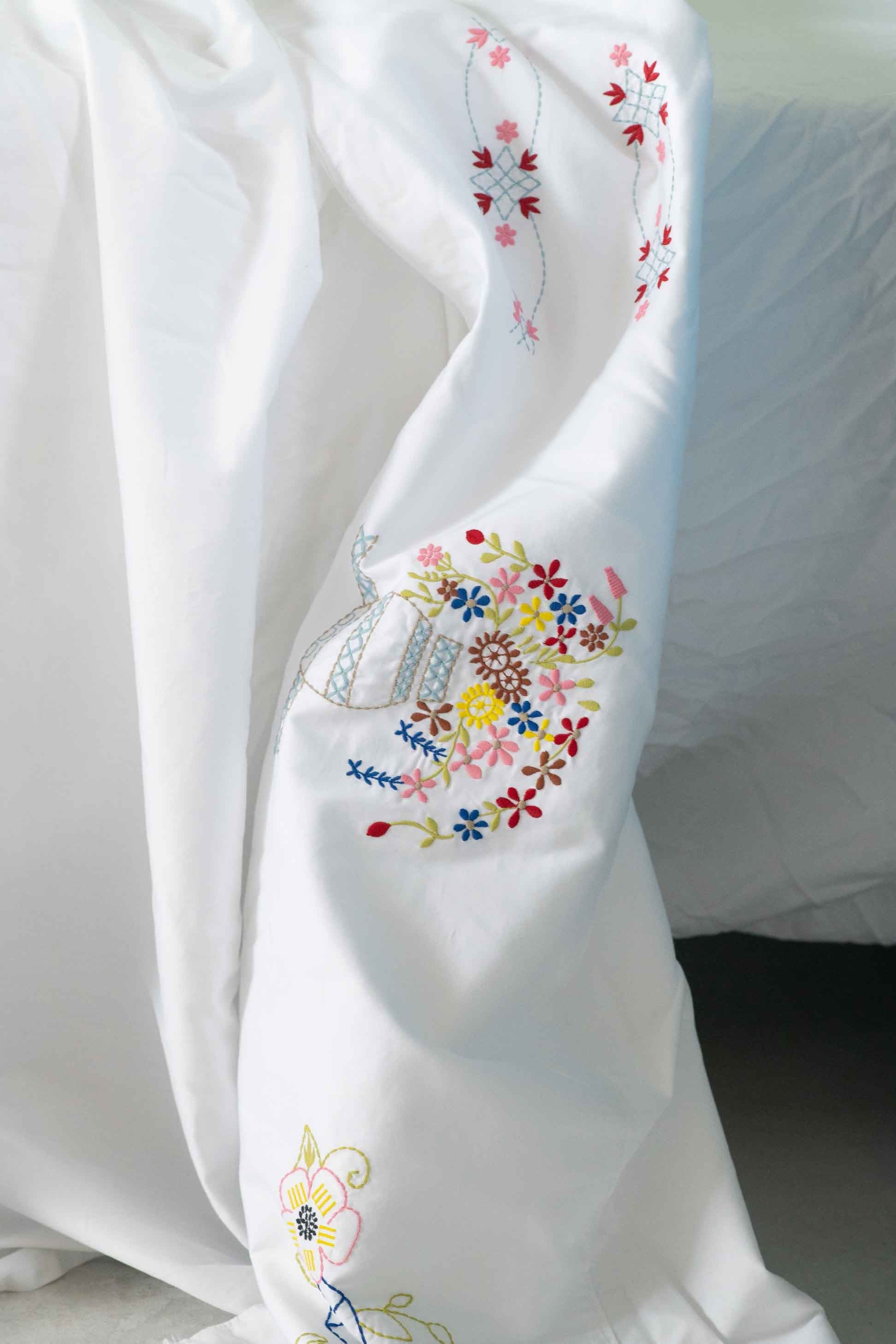 Embroidered white bedding detail - DSC4596