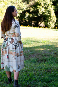 Gianna in insect print dress outdoors