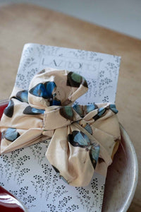 Butterfly-covered fabric wrapped around a book, HW_20butterflies