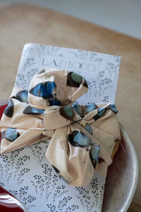 Butterfly-covered fabric wrapped around a book, HW_20butterflies