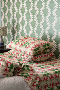 Kantha quilt Pelargonium sheets on bed