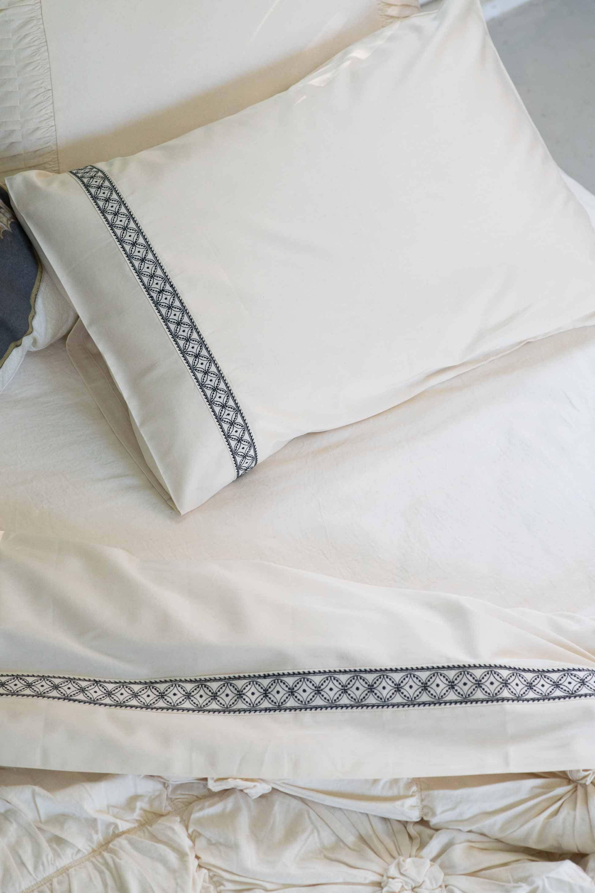 White pillowcase with embroidered trim