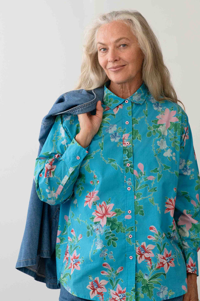 Lauren Bluesette floral shirt, woman with denim jacket.