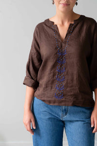 brown top & jeans
