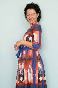Woman in Michaela dress, smiling