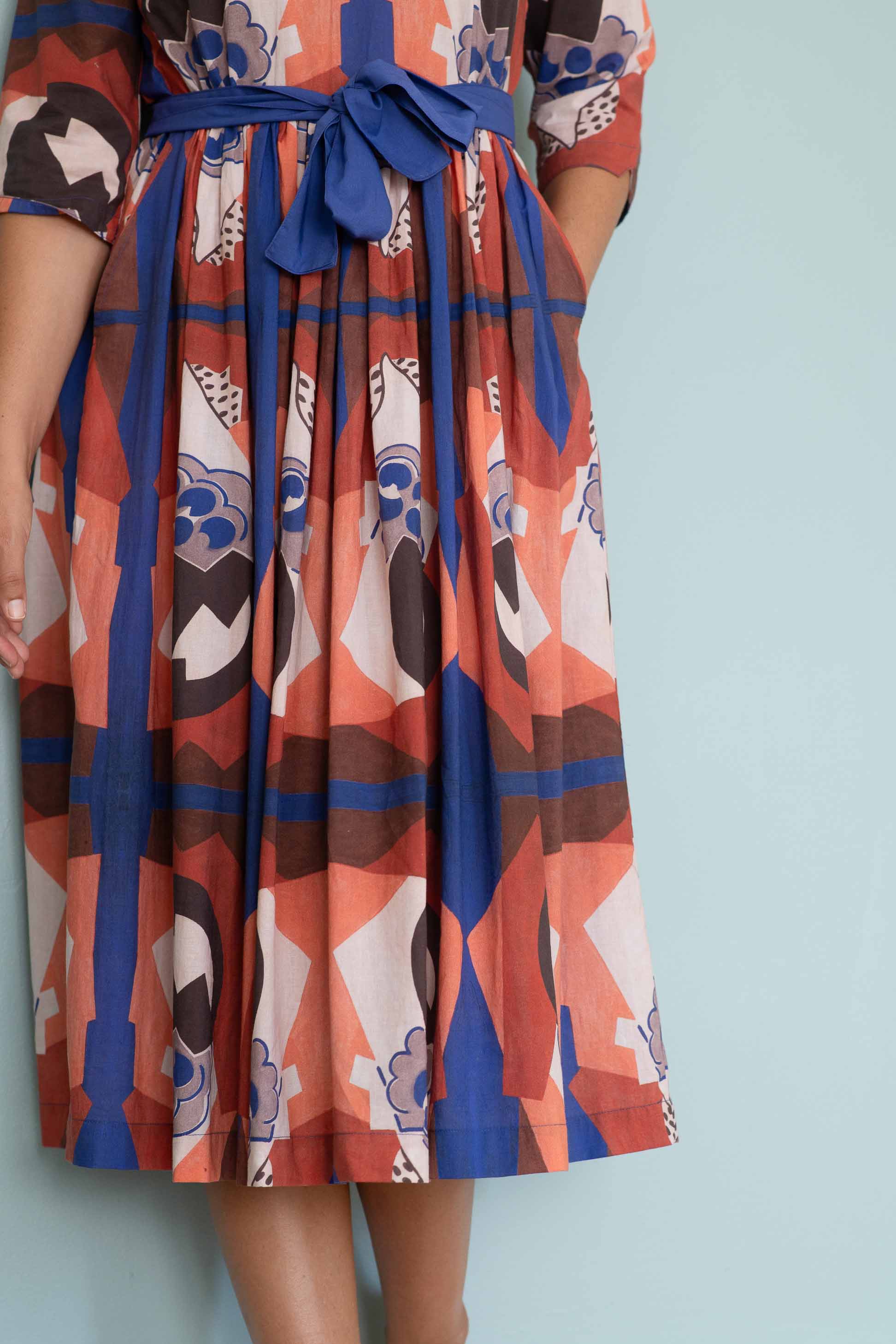 Patterned dress with blue and orange accents
