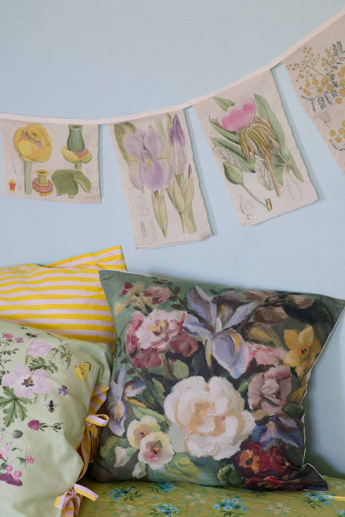 Painted floral cushion with flower banner