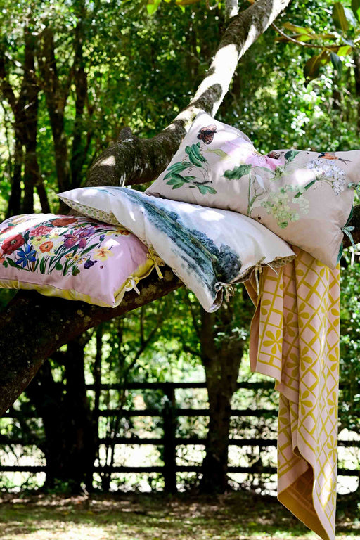 Pillowcases in tree with floral designs