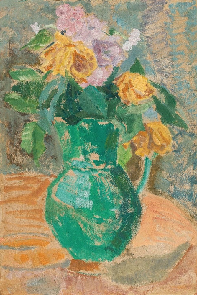 Green pitcher with yellow and pink flowers
