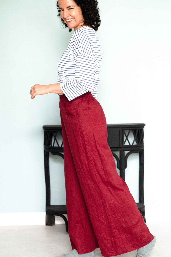 Woman in Solent Tee and Ollie Cherry trousers