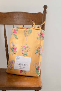 SummerlandSheets floral sheet set on chair