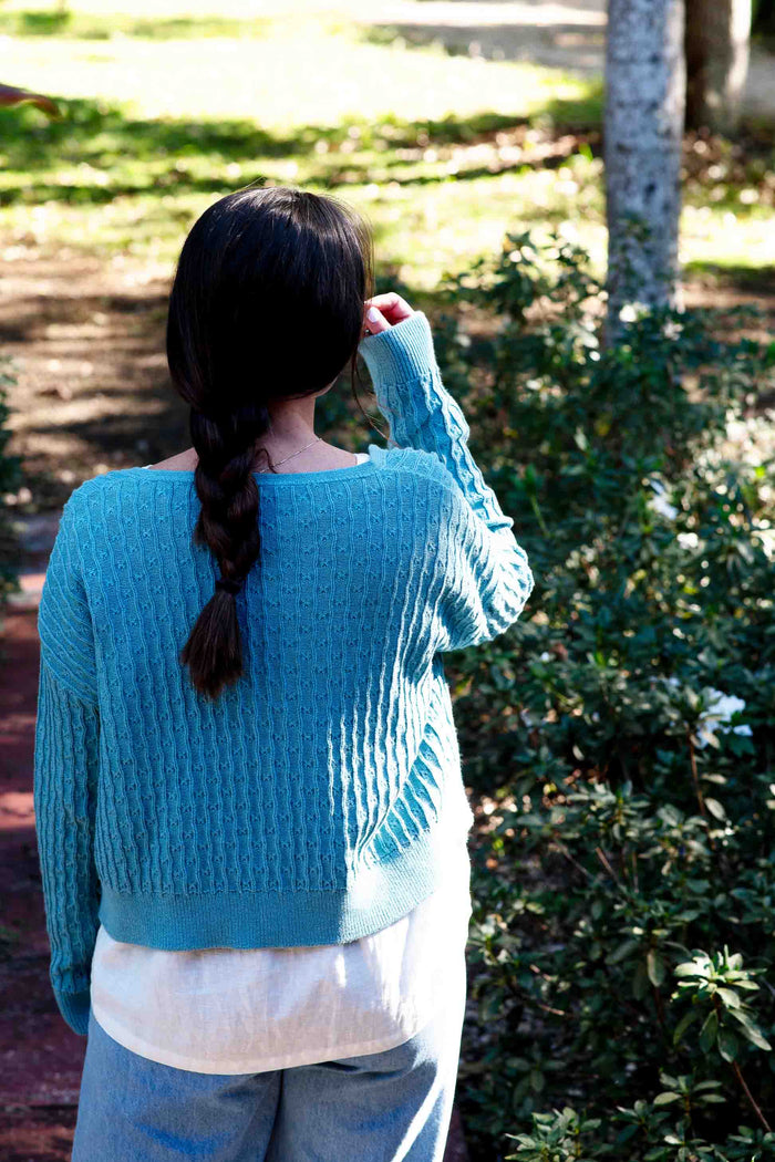 Woman in blue cardigan & jeans, SundayCardiganMarineLucyJeans