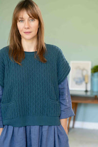Eliza Indigo wearing Sunday Vest petrol blue sweater