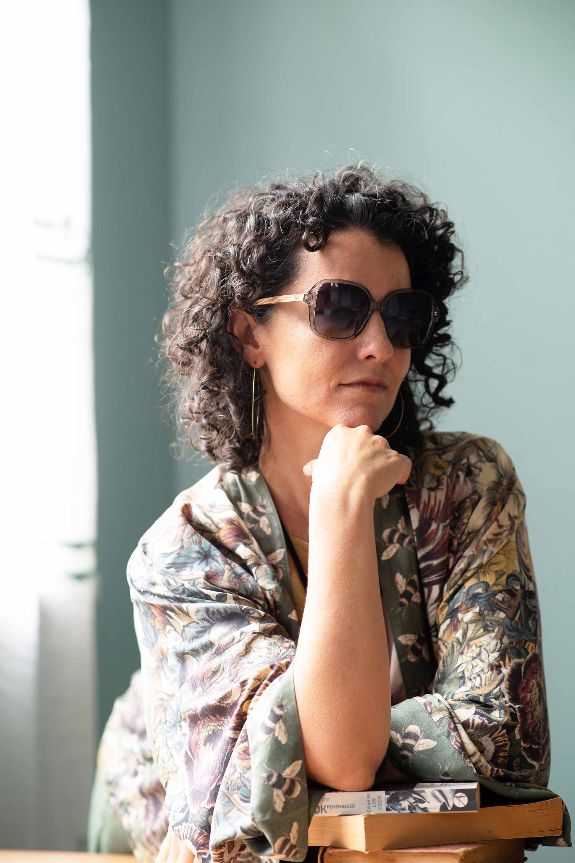 Woman in floral kimono & sunglasses