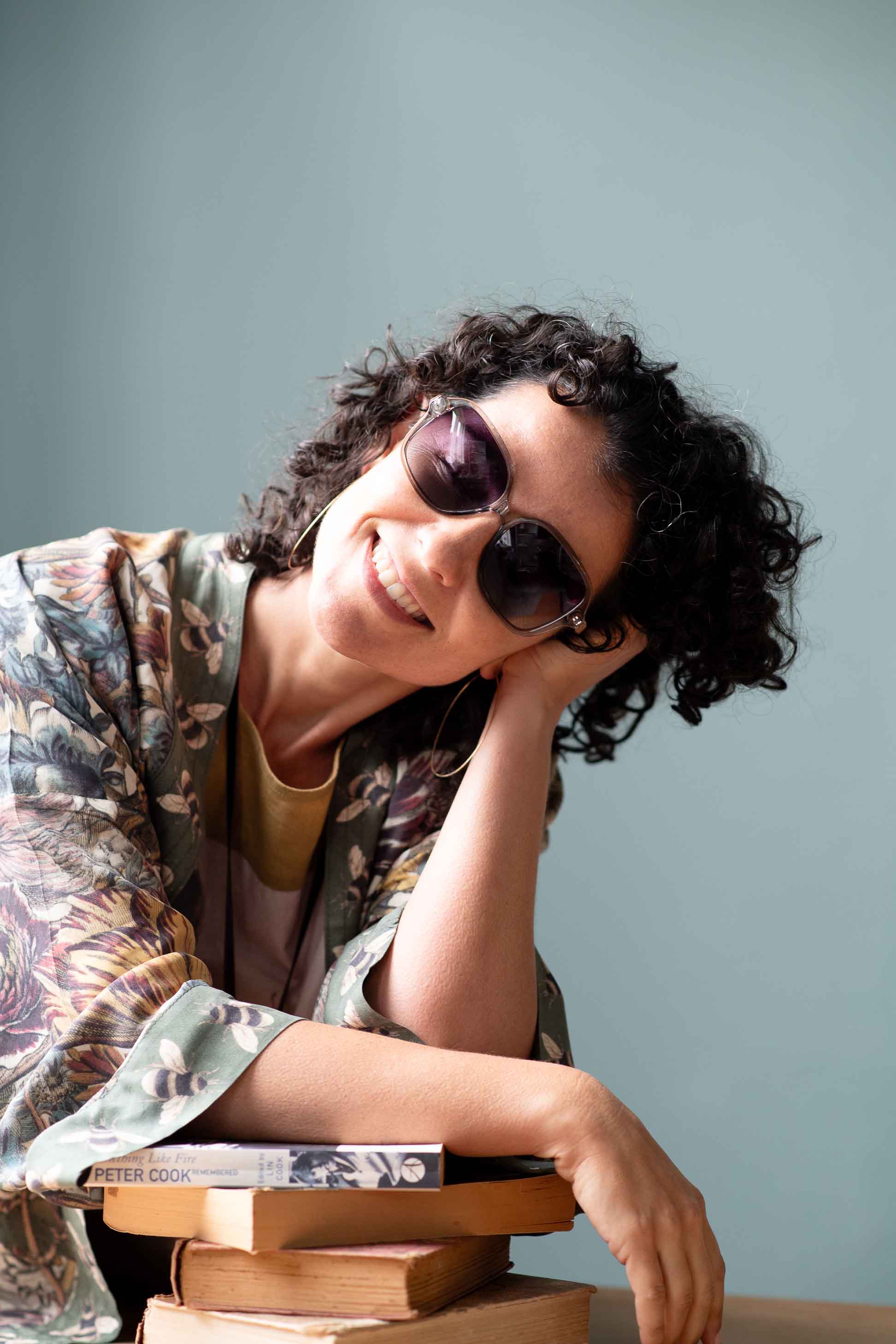 Woman in sunglasses and floral kimono