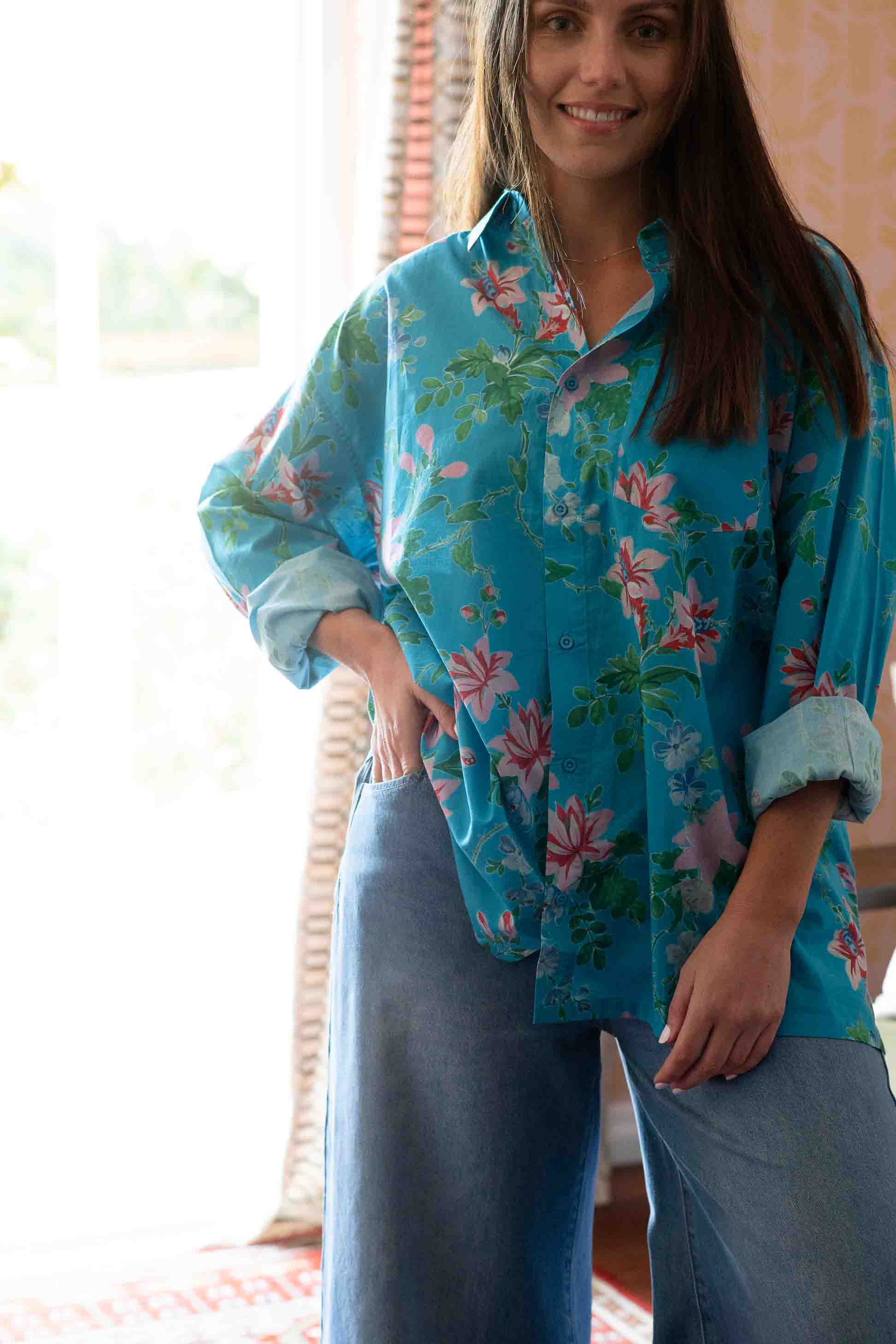 Ted Bluesette in floral shirt and denim jeans