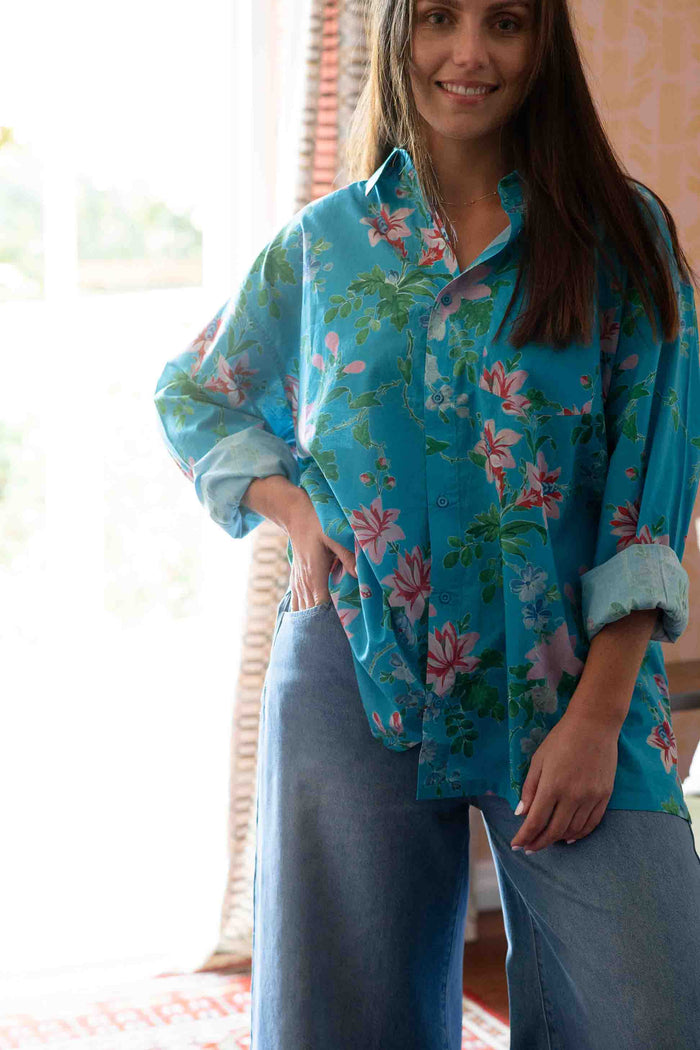 Ted Bluesette in floral shirt and denim jeans