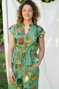 VidaTropics Ollie in floral green outfit