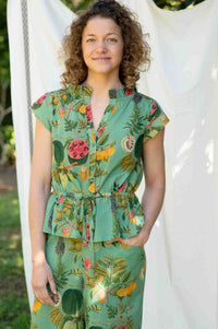 VidaTropics Ollie in floral green outfit