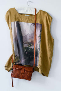 Woven leather bag & top on Peggy Garden wall