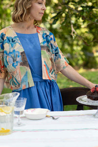 WrenGentianJaneLapis in blue dress with cake and floral kimono