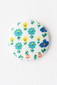Magnet Mindy floral magnet with blue, yellow, and orange flowers