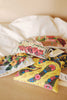 Pile of scented sachets with different vintage prints on them