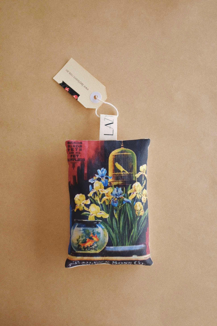 Orange and clove scented sachet with vintage image of a pet shop