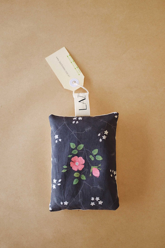 Lavender bag scented drawer sachet with vintage print of little pink rose on black background